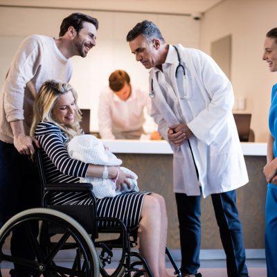 Doctors and patient interacting with each other