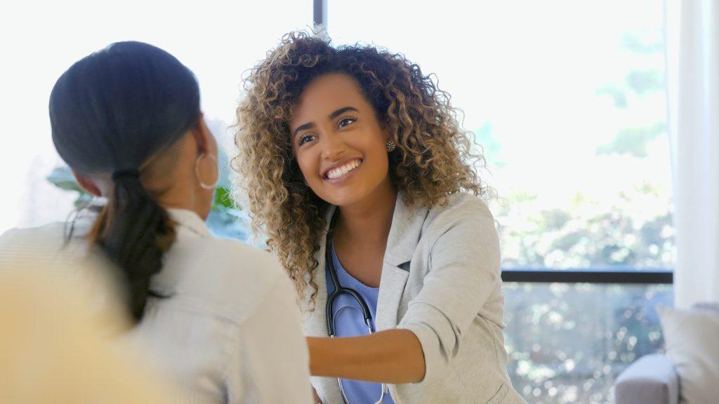 Doctor warmly greets new patient